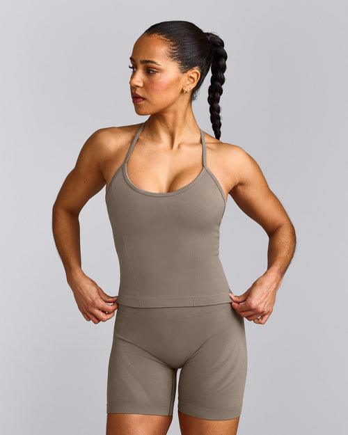EnhanceLift™ Seamless Strappy Racer Tank Top with Built in Bra Shelf with Gray Logo | Warm Minky