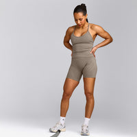 EnhanceLift™ Seamless Strappy Racer Tank Top with Built in Bra Shelf with Gray Logo | Warm Minky