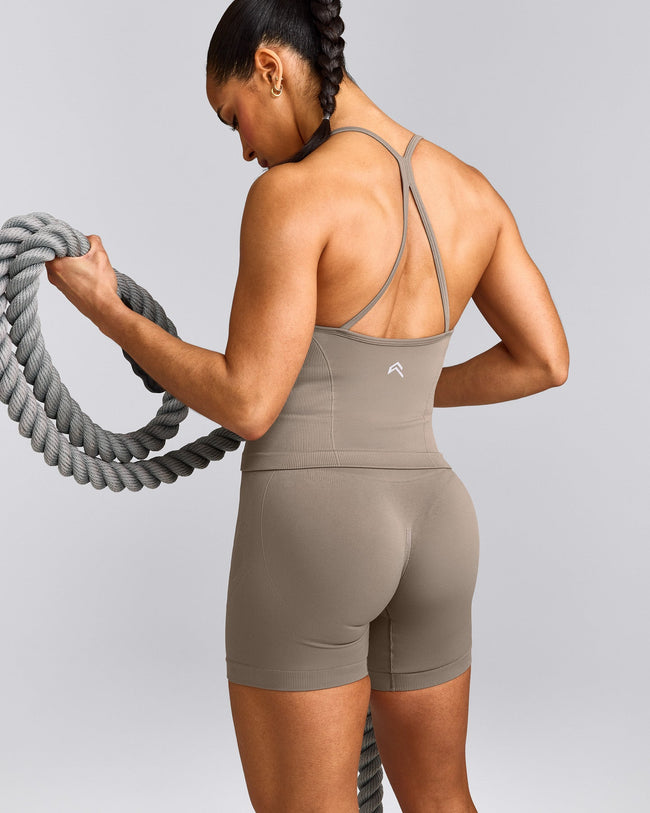 EnhanceLift™ Seamless Strappy Racer Tank Top with Built in Bra Shelf with Gray Logo | Warm Minky