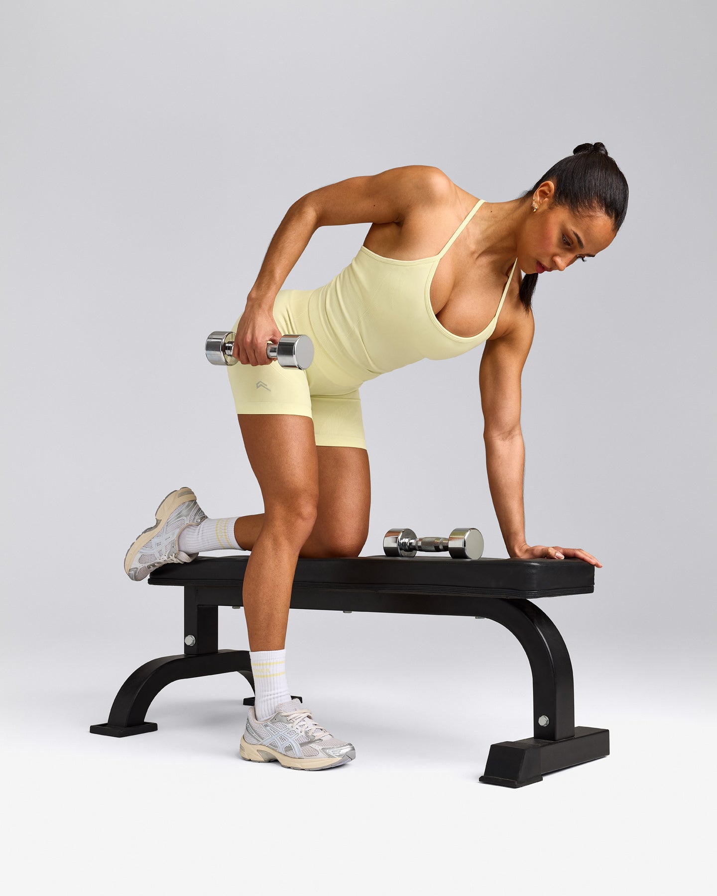 EnhanceLift™ Seamless Strappy Racer Tank Top with Built in Bra Shelf with Gray Logo | Pastel Yellow