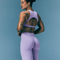SoftMotion™ High Neck Sports Bra with Grey Logo | Lavender Purple