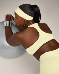 SoftMotion™ Bralette with Grey Logo | Pastel Yellow