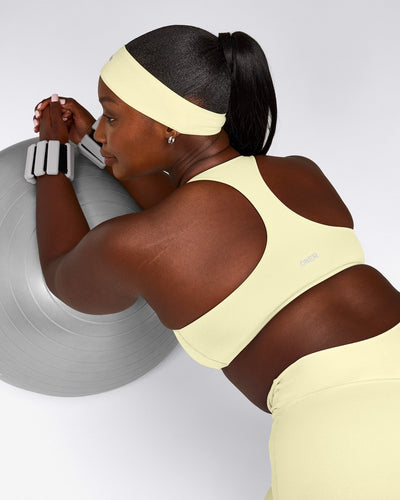 SoftMotion™ Bralette with Gray Logo | Pastel Yellow