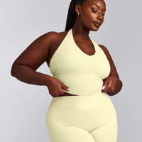 SoftMotion™ Halter Neck Mid Tank Top with Built in Bra Shelf with Gray Logo | Pastel Yellow