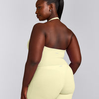 SoftMotion™ Halter Neck Mid Tank Top with Built in Bra Shelf with Gray Logo | Pastel Yellow