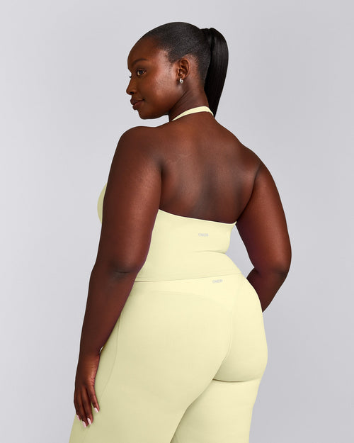 SoftMotion™ Halter Neck Mid Tank Top with Built in Bra Shelf with Gray Logo | Pastel Yellow