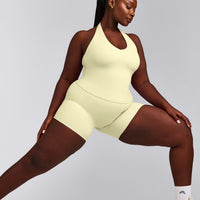 SoftMotion™ Halter Neck Tank Top with Built in Bra Shelf with Gray Logo | Pastel Yellow