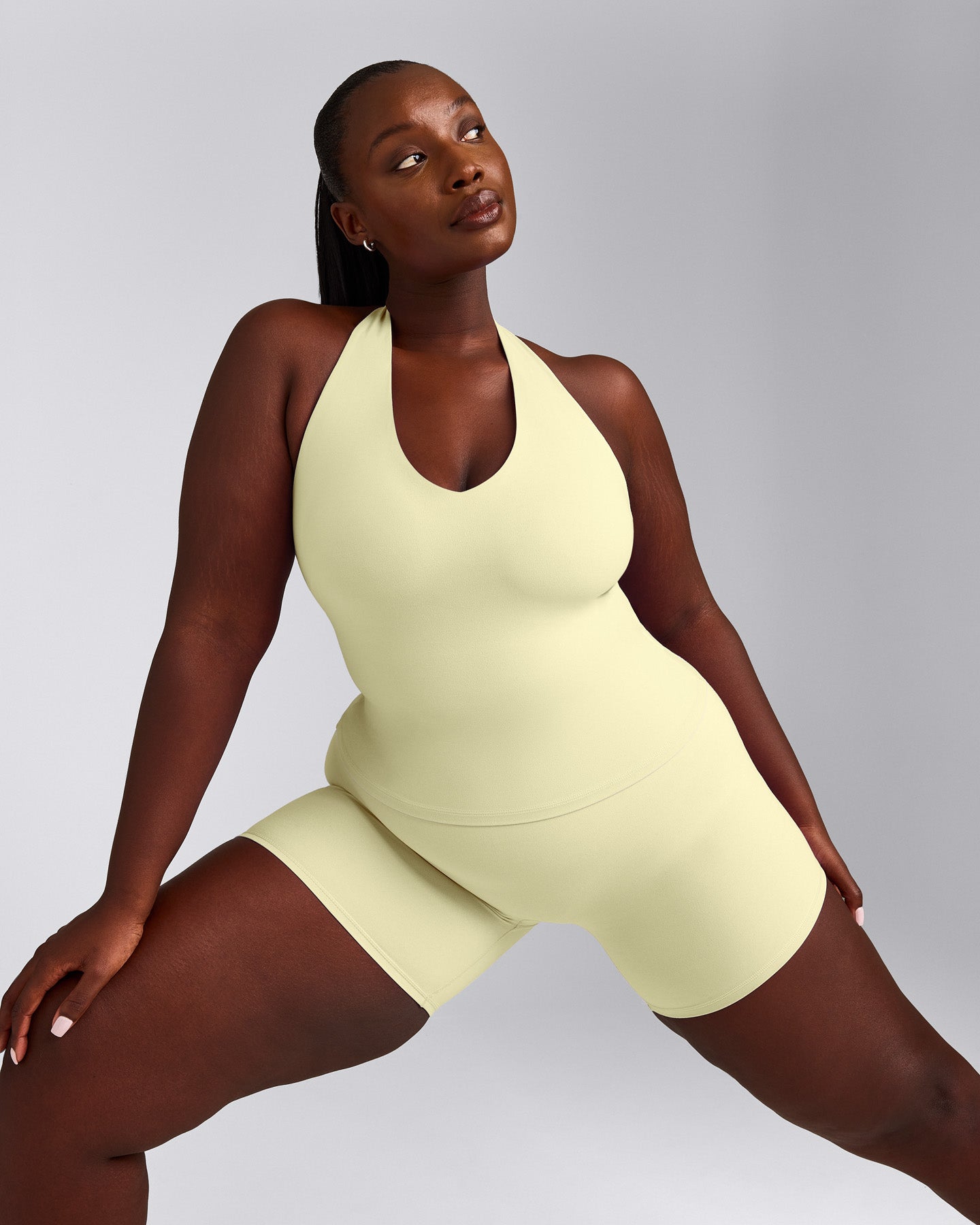SoftMotion™ Halter Neck Tank Top with Built in Bra Shelf with Gray Logo | Pastel Yellow