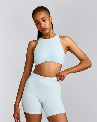 SoftMotion™ High Neck Sports Bra with Grey Logo |  Cloud Blue
