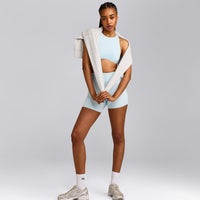 SoftMotion™ High Neck Sports Bra with Grey Logo |  Cloud Blue