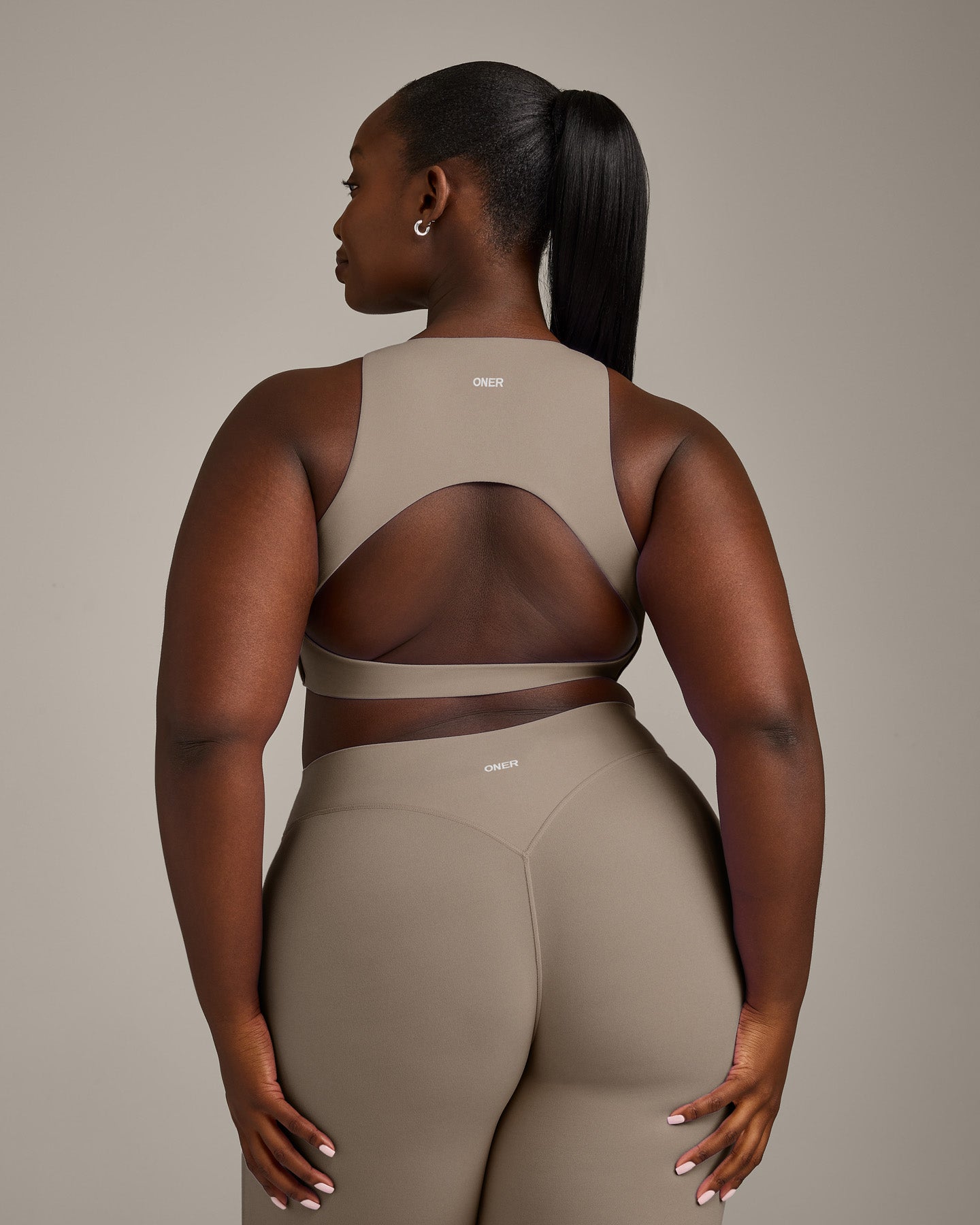 SoftMotion™ High Neck Sports Bra with Grey Logo | Minky