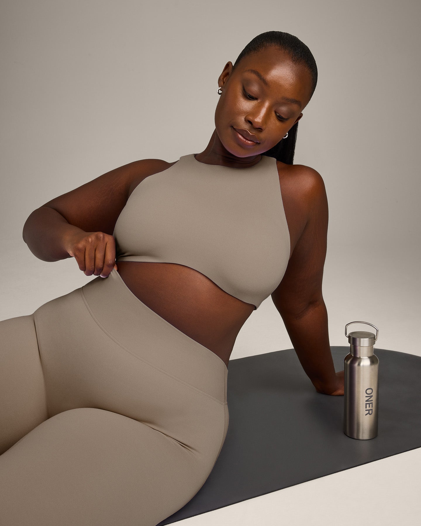 SoftMotion™ High Neck Sports Bra with Grey Logo | Minky