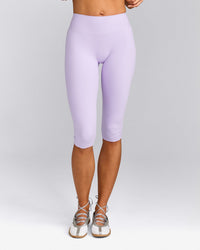 SoftMotion™ High Waisted Capri Leggings with Gray Logo | Lavender Purple