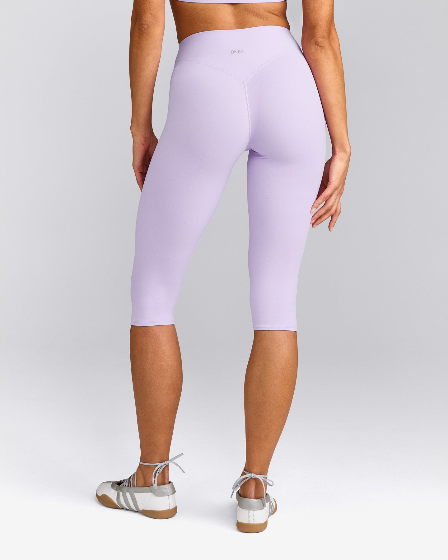 SoftMotion™ High Waisted Capri Leggings with Gray Logo | Lavender Purple