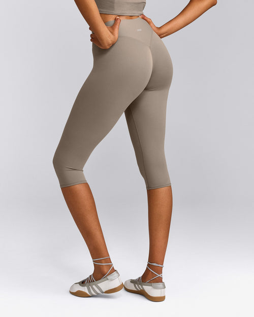 SoftMotion™ High Waisted Capri Leggings with Gray Logo | Minky