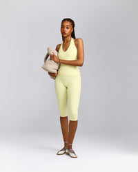SoftMotion™ High Waisted Capri Leggings with Gray Logo | Pastel Yellow