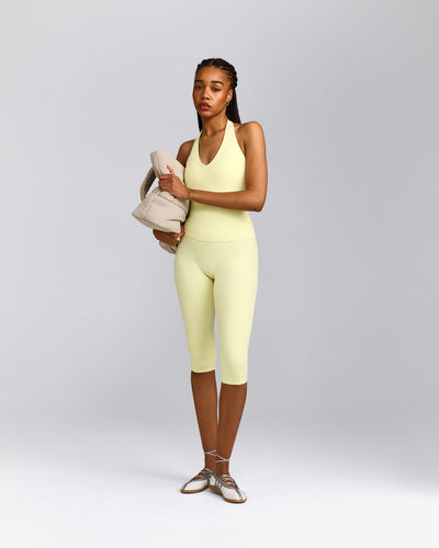 SoftMotion™ High Waisted Capri Leggings with Gray Logo | Pastel Yellow