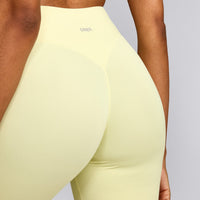 SoftMotion™ High Waisted Capri Leggings with Gray Logo | Pastel Yellow