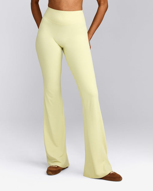 SoftMotion™ Flared Trousers with Gray Logo | Pastel Yellow