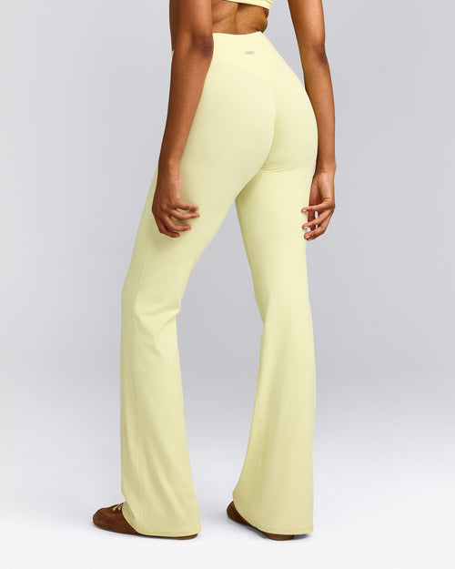 SoftMotion™ Flared Trousers with Gray Logo | Pastel Yellow