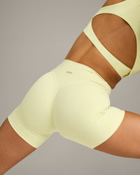 SoftMotion™ High Waisted Shorts 6" with Grey Logo | Pastel Yellow