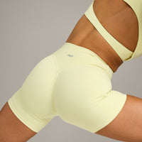 SoftMotion™ High Waisted Shorts 6" with Grey Logo | Pastel Yellow