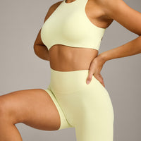 SoftMotion™ High Waisted Shorts 6" with Grey Logo | Pastel Yellow