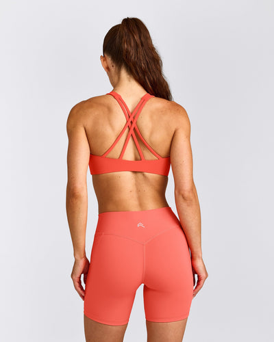 EasyLift™ High Neck Sports Bra with Grey Logo | Hyper Orange