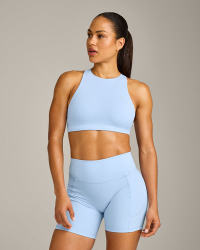 EasyLift™ High Neck Sports Bra with Grey Logo | Powdered Blue