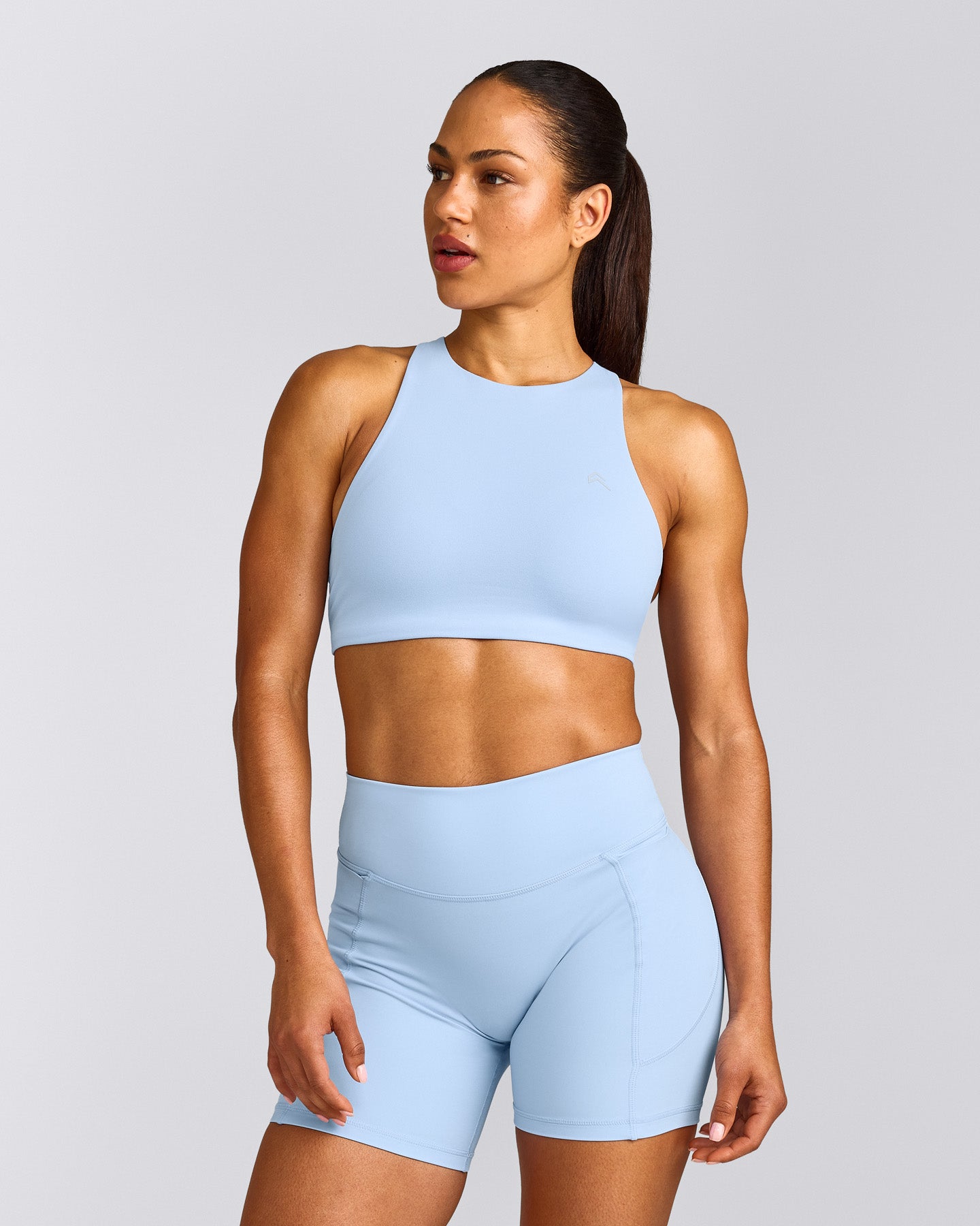 EasyLift™ High Neck Sports Bra with Gray Logo | Powdered Blue