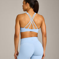 EasyLift™ High Neck Sports Bra with Grey Logo | Powdered Blue