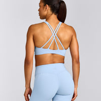 EasyLift™ High Neck Sports Bra with Gray Logo | Powdered Blue
