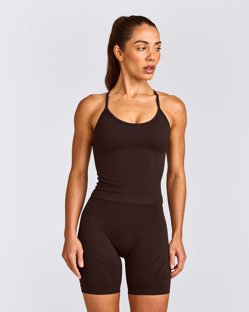 EnhanceLift™ Seamless Strappy Racer Tank Top with Built in Bra Shelf with Gray Logo | 70% Cocoa