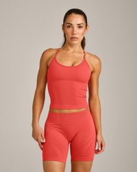 EnhanceLift™ Seamless Strappy Racer Vest with Built in Bra Shelf with Grey Logo | Dark Charged Coral