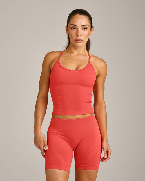 EnhanceLift™ Seamless Strappy Racer Vest with Built in Bra Shelf with Grey Logo | Dark Charged Coral