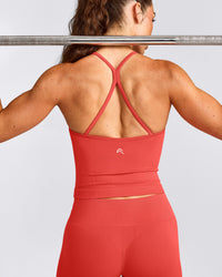 EnhanceLift™ Seamless Strappy Racer Tank Top with Built in Bra Shelf with Gray Logo | Dark Charged Coral