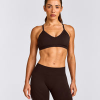 EnhanceLift™ Seamless Strappy Sports Bra with Gray Logo | 70% Cocoa