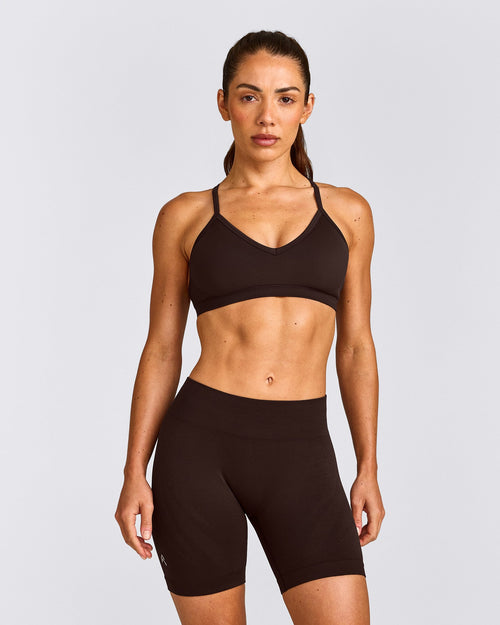 EnhanceLift™ Seamless Strappy Sports Bra with Gray Logo | 70% Cocoa