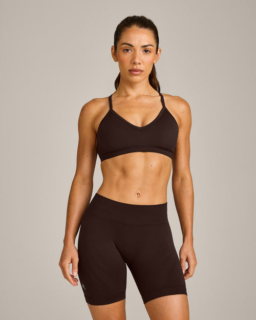 EnhanceLift™ Seamless Strappy Sports Bra with Grey Logo | 70% Cocoa