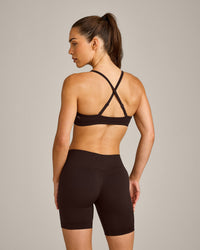 EnhanceLift™ Seamless Strappy Sports Bra with Grey Logo | 70% Cocoa
