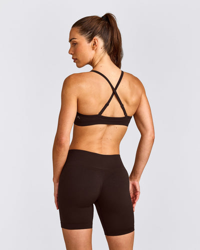 EnhanceLift™ Seamless Strappy Sports Bra with Gray Logo | 70% Cocoa