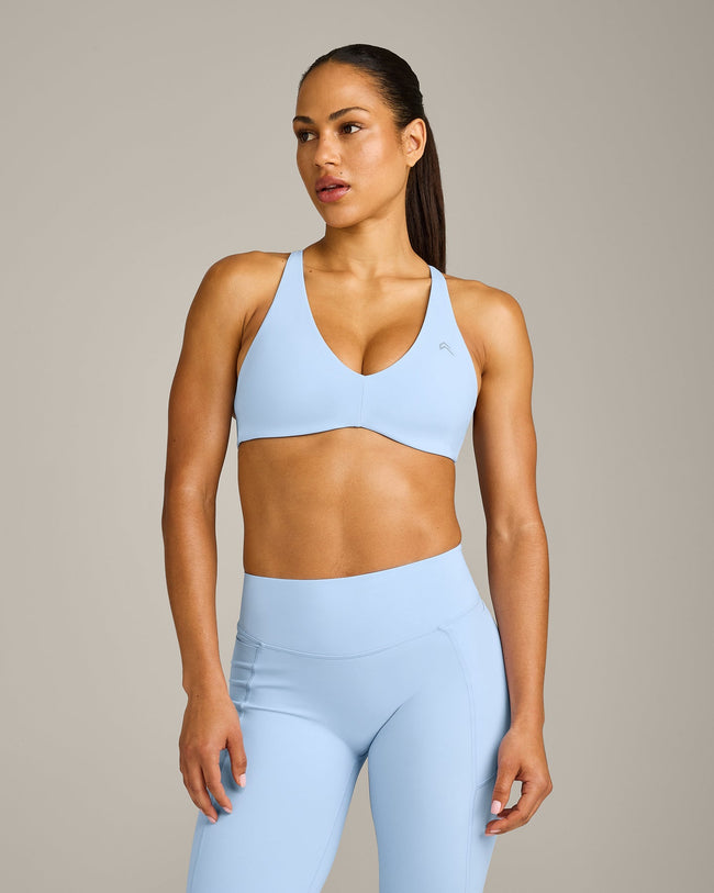 UnifiedMove™ Cross Back Sports Bra with Reflective Logo | Powdered Blue