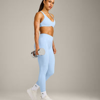 UnifiedMove™ Cross Back Sports Bra with Reflective Logo | Powdered Blue