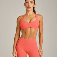 UnifiedMove™ T Back Minimal Bralette with Reflective Logo | Light Charged Coral