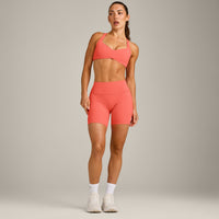 UnifiedMove™ T Back Minimal Bralette with Reflective Logo | Light Charged Coral