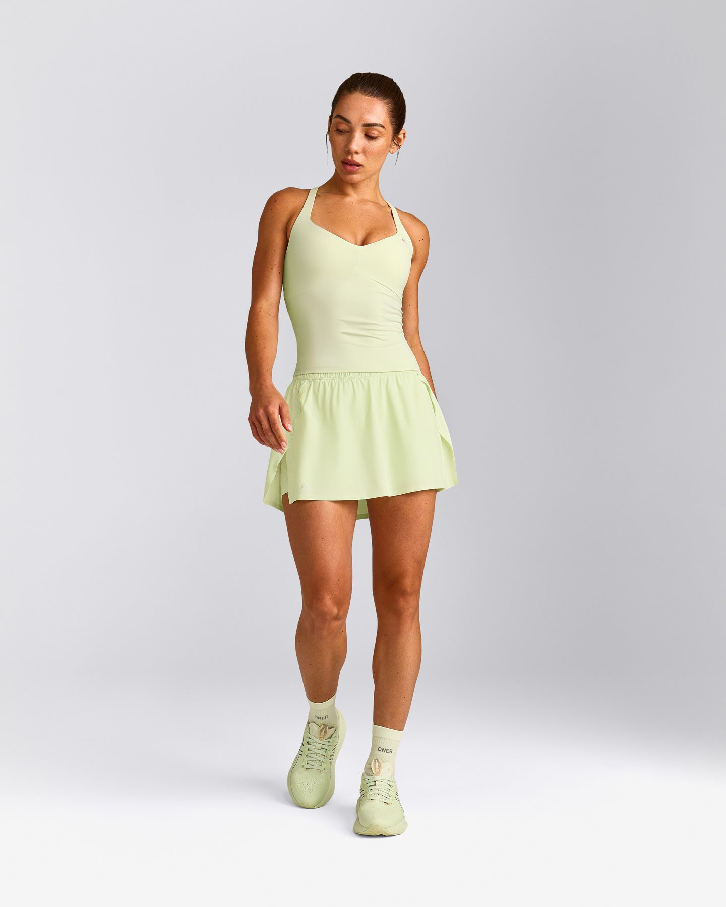 UnifiedMove™ T Back Mid Vest with Built in Bra Shelf New Branding | Meadow Mist Green