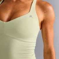 UnifiedMove™ T Back Mid Vest with Built in Bra Shelf New Branding | Meadow Mist Green
