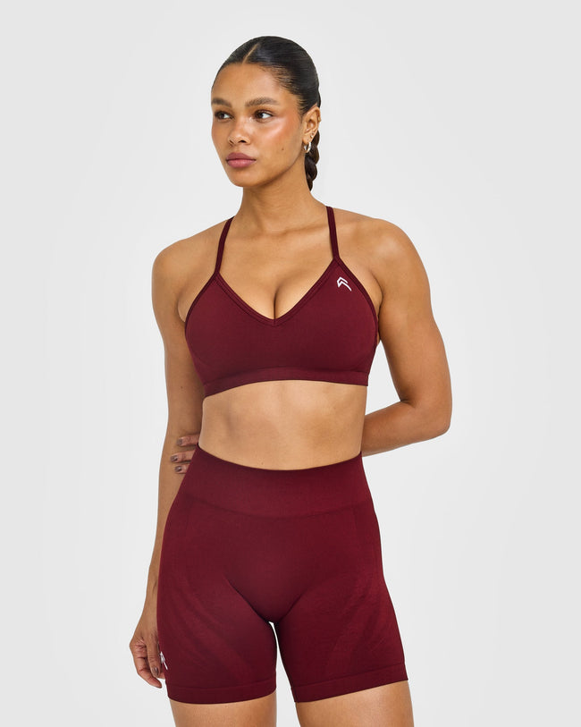 EnhanceLift™ Seamless Strappy Sports Bra with White Logo | Rosewood