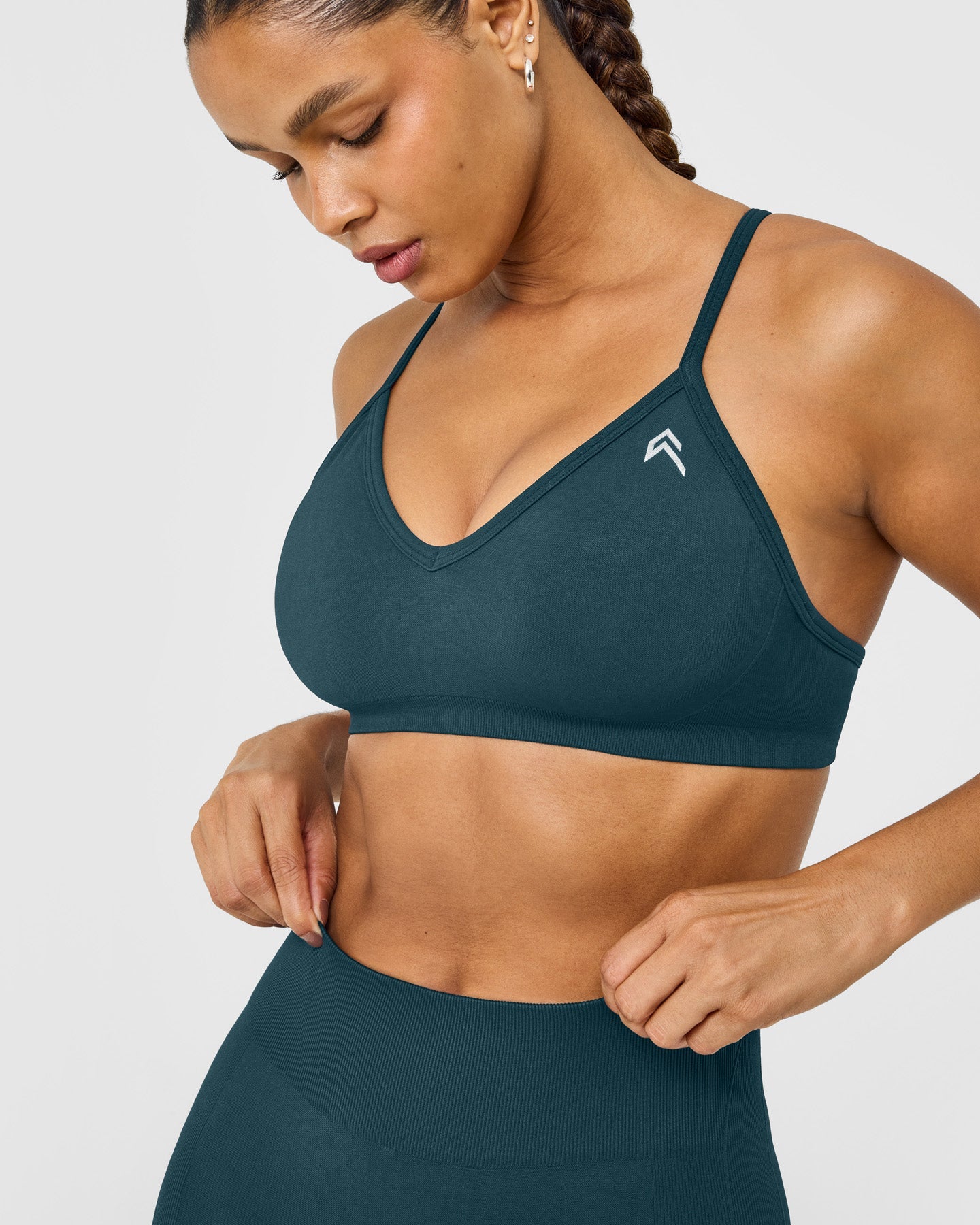 EnhanceLift™ Seamless Strappy Sports Bra with White Logo | Washed Oil Blue