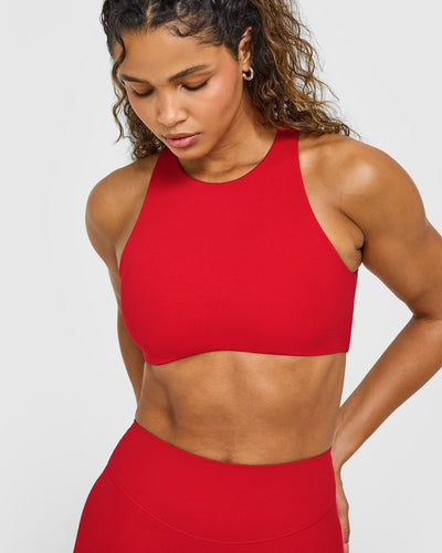 SoftMotion™ High Neck Sports Bra with White Logo | Light Toasted Red